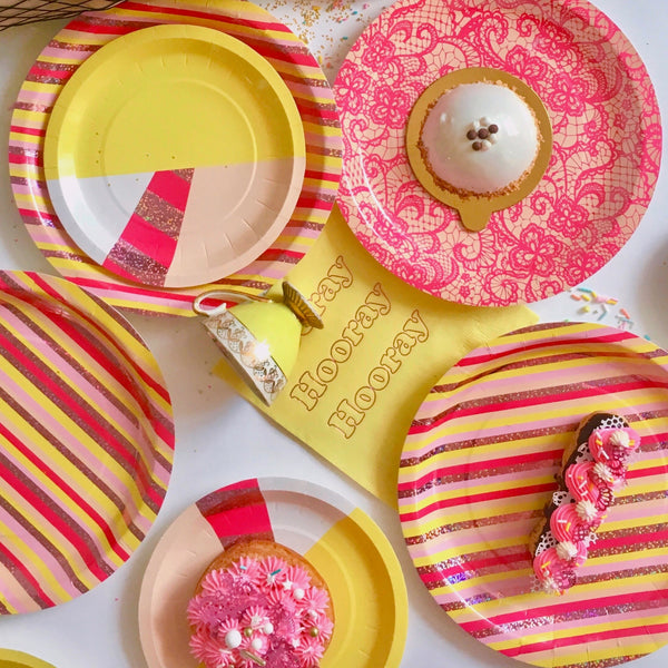 Pink and shop yellow paper plates